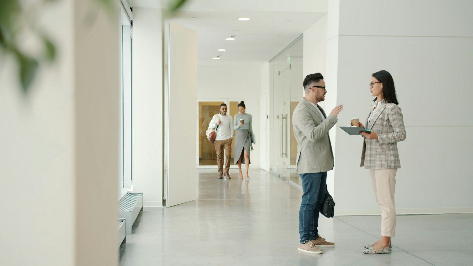 Two people meeting in a modern office